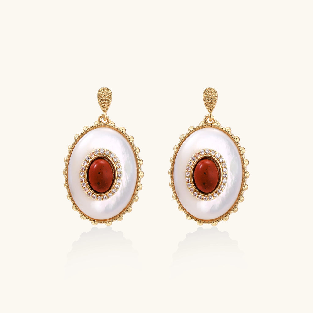 Gold-plated drop earrings with layered oval mother-of-pearl and cognac gemstone center framed by crystal halo