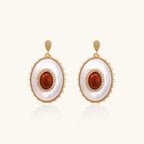 Gold-plated drop earrings with layered oval mother-of-pearl and cognac gemstone center framed by crystal halo
