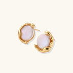 Gold vermeil studs with lustrous pink freshwater pearls in organic crescent settings