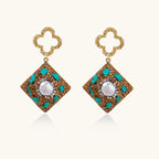 Gold-plated drop earrings with quatrefoil studs, diamond-shaped pendants featuring baroque pearls, turquoise stones, and amber crystals