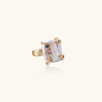 Gold ring with large iridescent baroque pearl and four colored gemstones on textured band