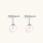 Rhodium-plated sterling silver ear jacket earrings with diamond-set horizontal bar and freshwater pearl drop