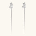 Silver-toned threader earrings featuring detailed fairy figure with wings and dual delicate chain strands, zirconia accents