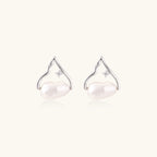 Silver mountain outline studs with baroque pearl and diamond accent on white background