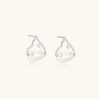 Silver mountain outline studs with baroque pearl and diamond accent on white background
