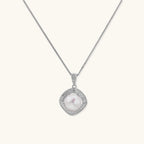 Cushion-shaped double halo pendant with 10mm freshwater pearl center on rhodium-plated sterling silver chain