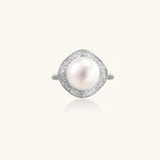 Rhodium-plated silver ring with round pearl center, double halo of baguette and round crystals forming cushion shape