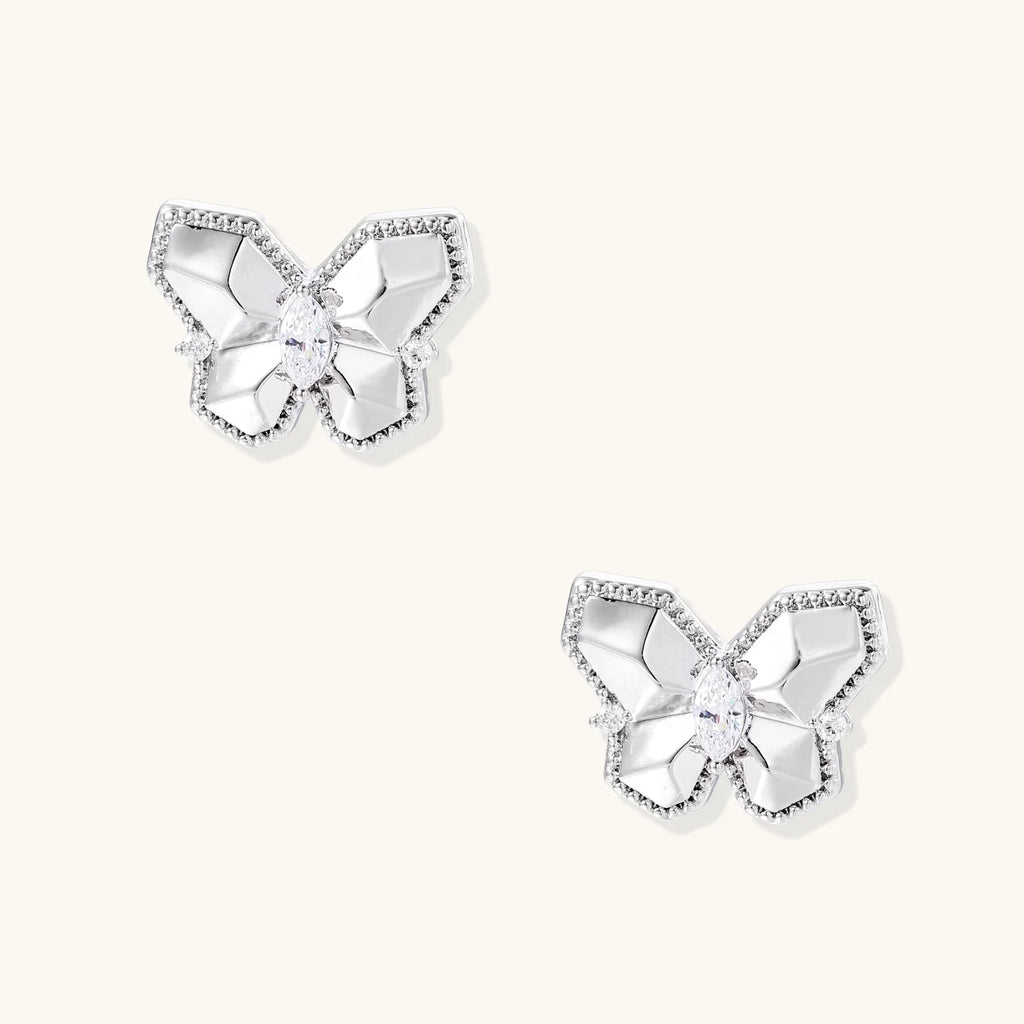 Silver butterfly stud earrings with marquise center stone and pavé crystal border on white background