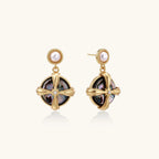 Gold-plated drop earrings with iridescent abalone shell and pearl studs in geometric cross design