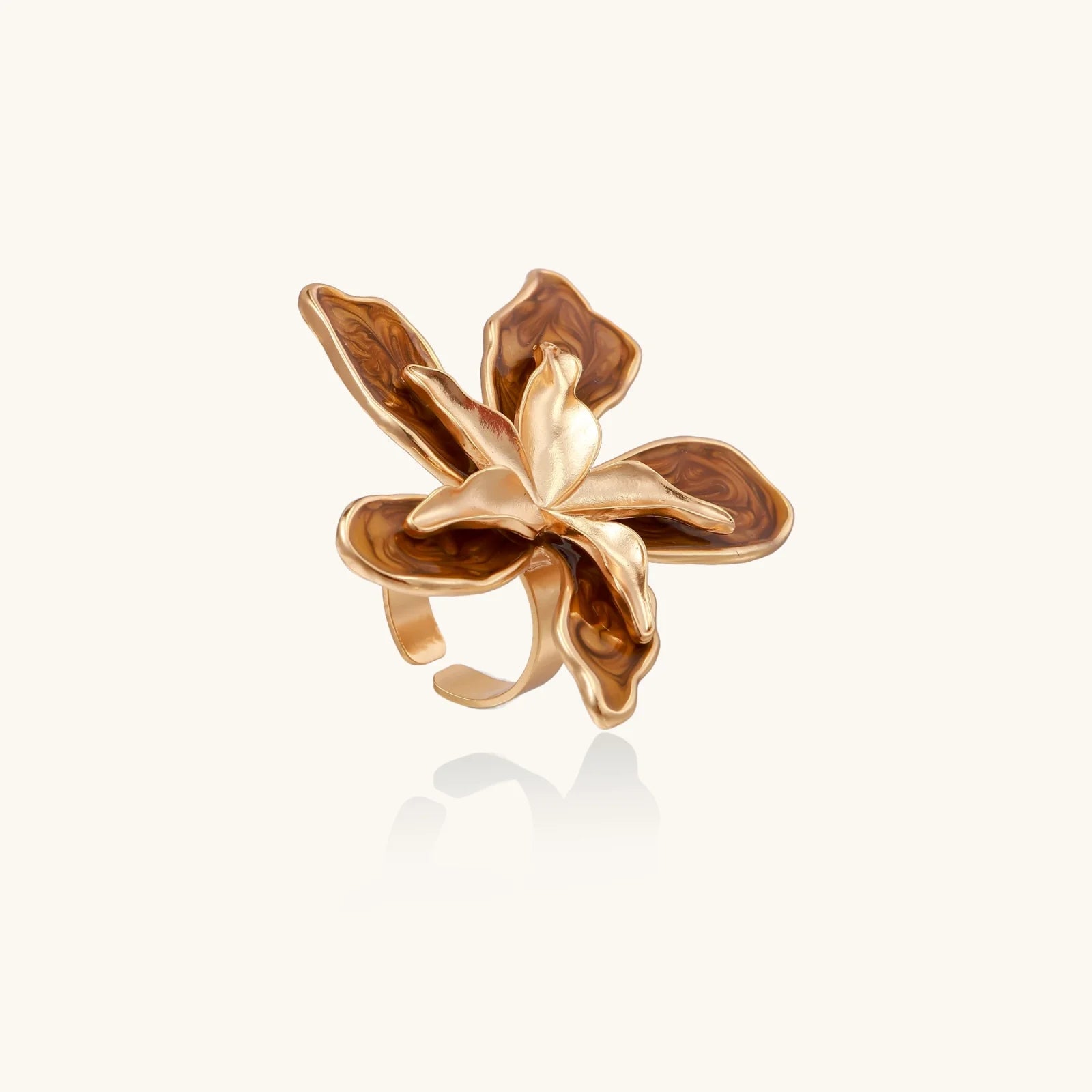 Large rose gold ring with marbled brown enamel petals in a sculptural flower design