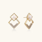 Gold-plated double square frame earrings with freshwater pearl and crystal accents on white background