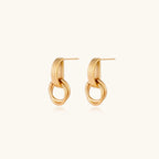 Gold stud earrings with vertical ridged bar connecting to triple interlocking circular rings on white background
