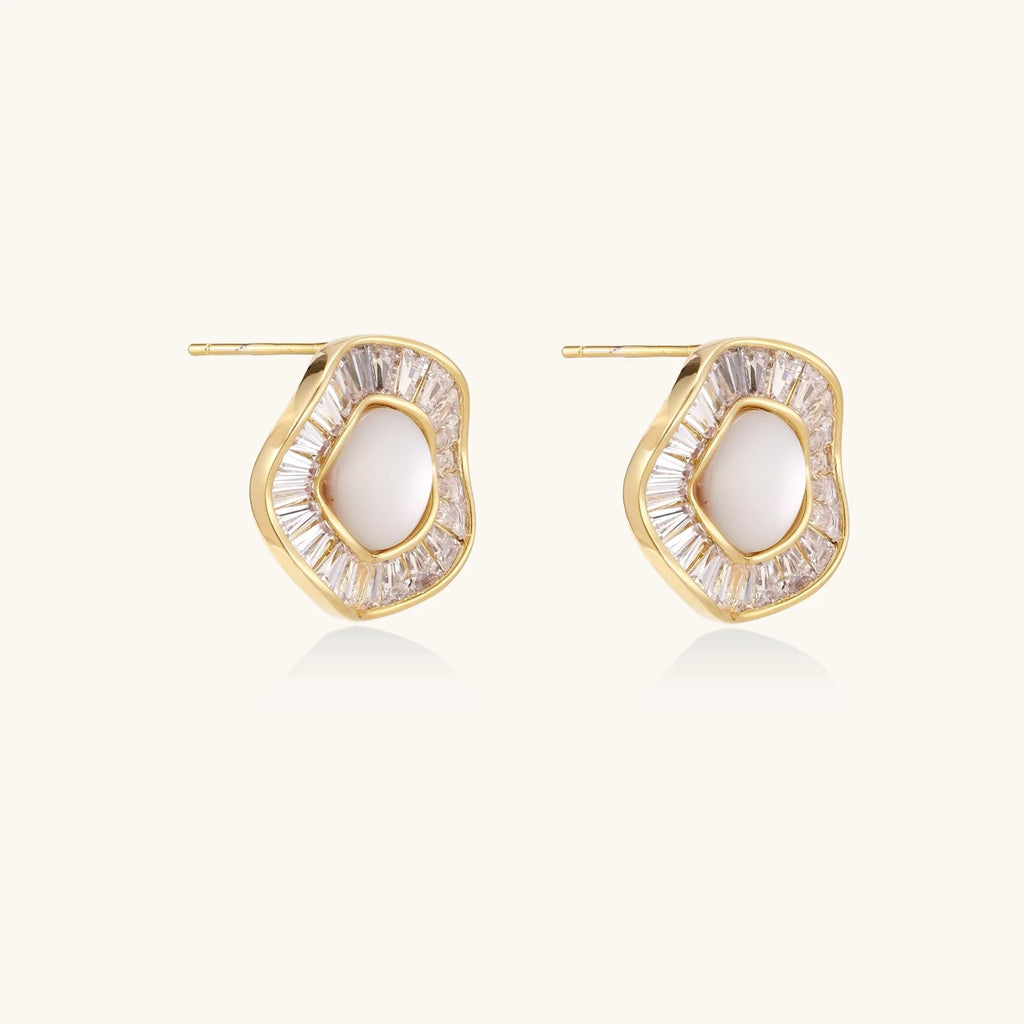 14K gold-plated stud earrings with freshwater pearl center surrounded by baguette-cut crystal halo in sunburst design