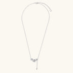 White gold plated Y-shaped necklace with three dimensional flower charms and adjustable drop pendant