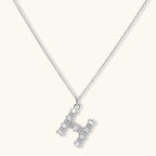 Letter H jewelry set featuring geometric crystal design in gold and white gold plated finish with adjustable chain necklace
