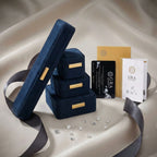 Round green moissanite stud earrings in sterling silver halo settings with brilliant sparkle on white background.